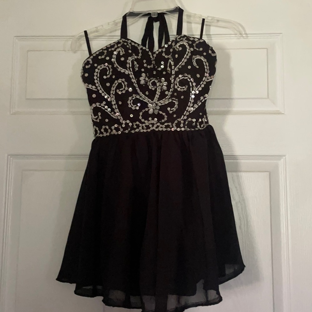 Is it a mini dress or top?